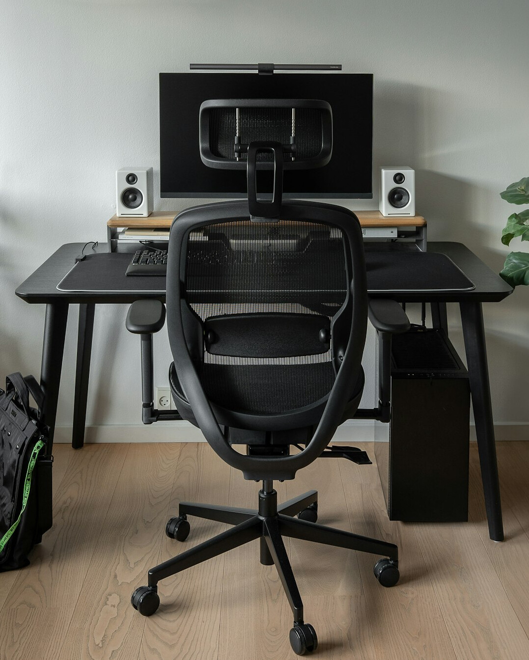 Modern analytics workspace with monitors showing charts