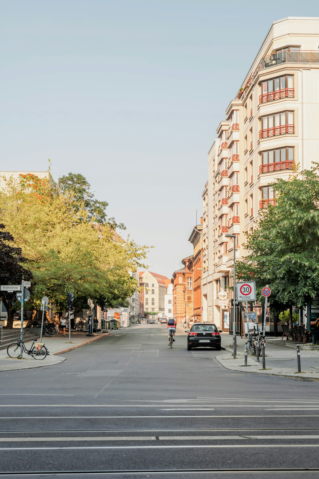 Quiet German city street with a modern office building