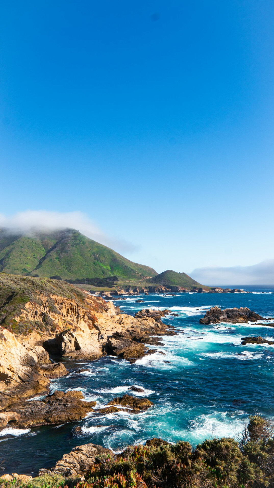 Zapallar bay with elegant coastal houses and sandy beach in Chile