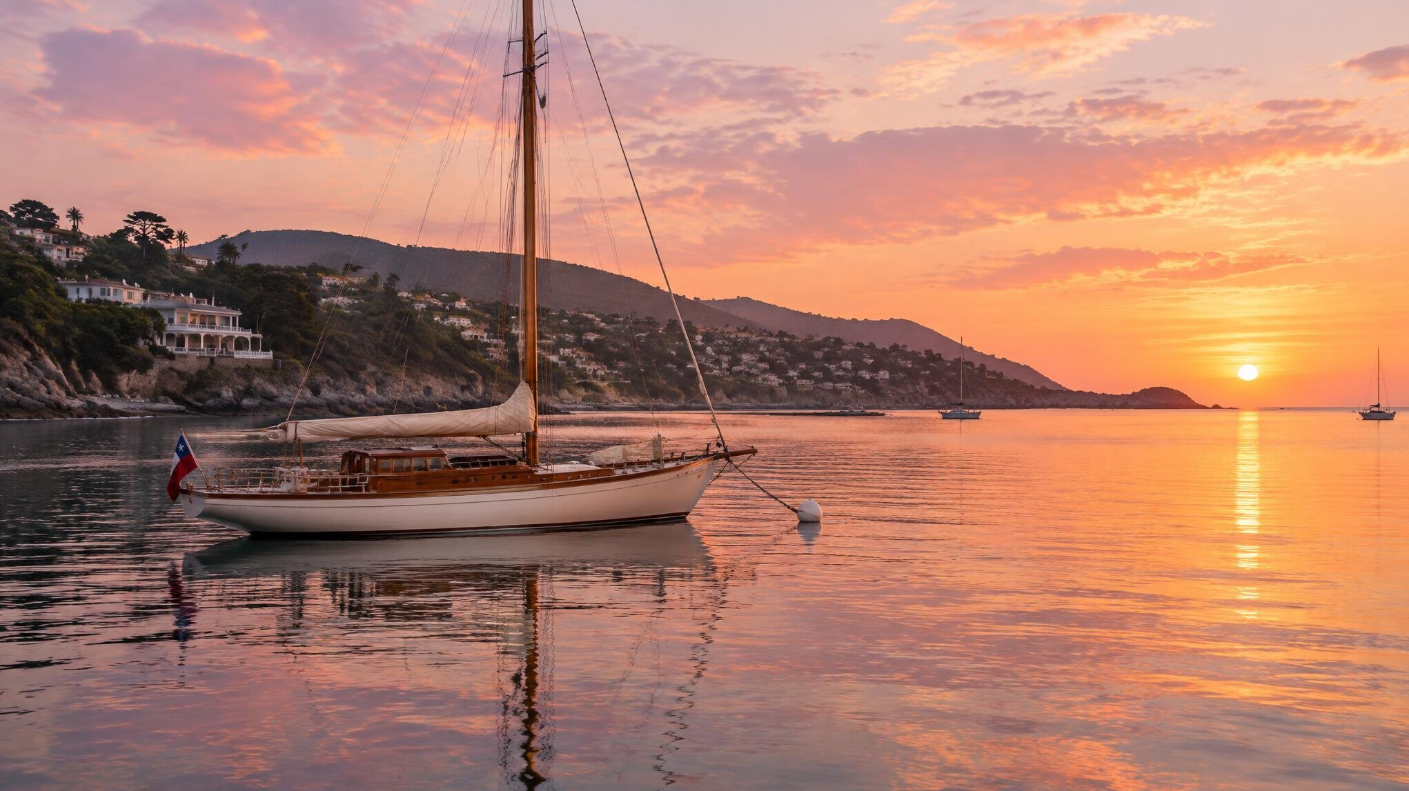 Classic wooden sailing yacht in Zapallar bay Chile